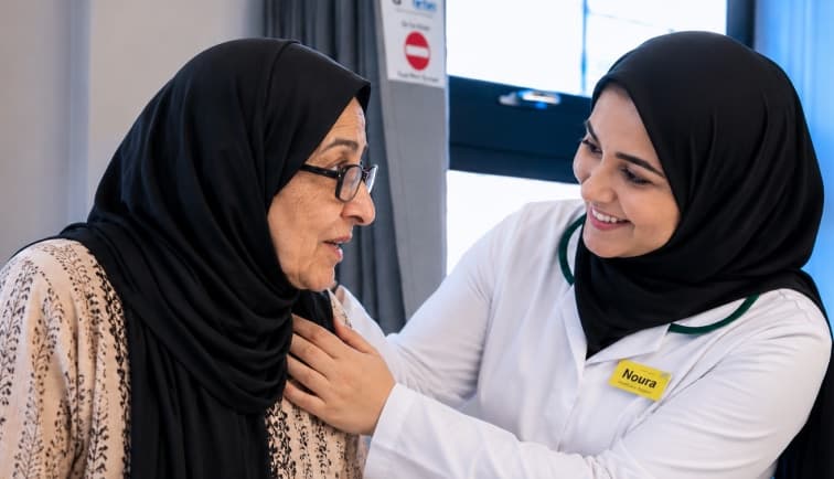 Healthcare professionals talking with a patient